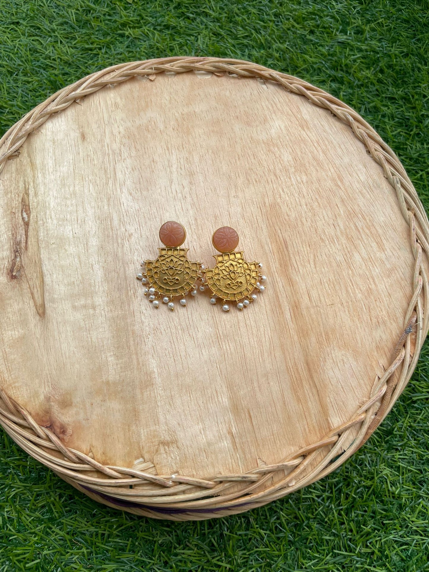 gold metal earrings for women with pink stones. dangling pearls in this handmade pair