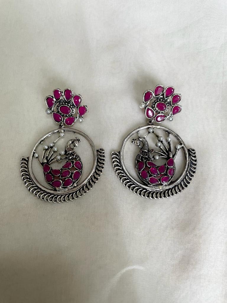 handmade and affordable earrings in pink for women, with peacock carving, buy now in Singapore