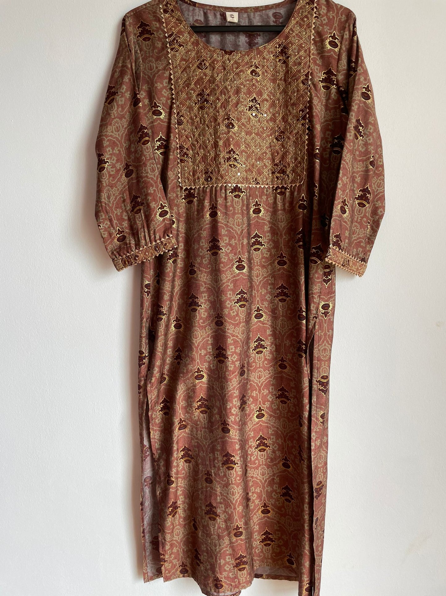Indian traditional wear with gold embroidery