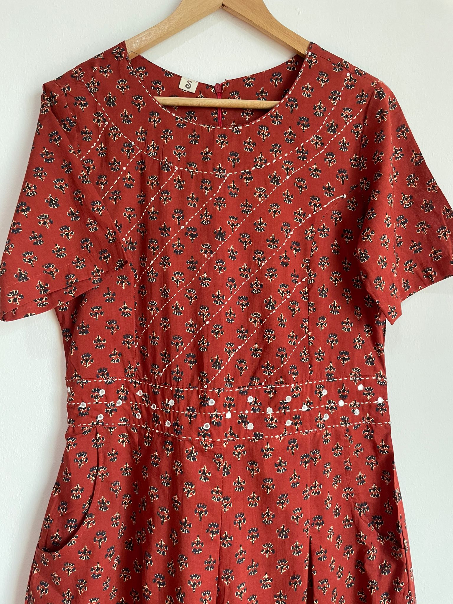 flowy jumpsuit that is block printed and made from 100 percent cotton for women