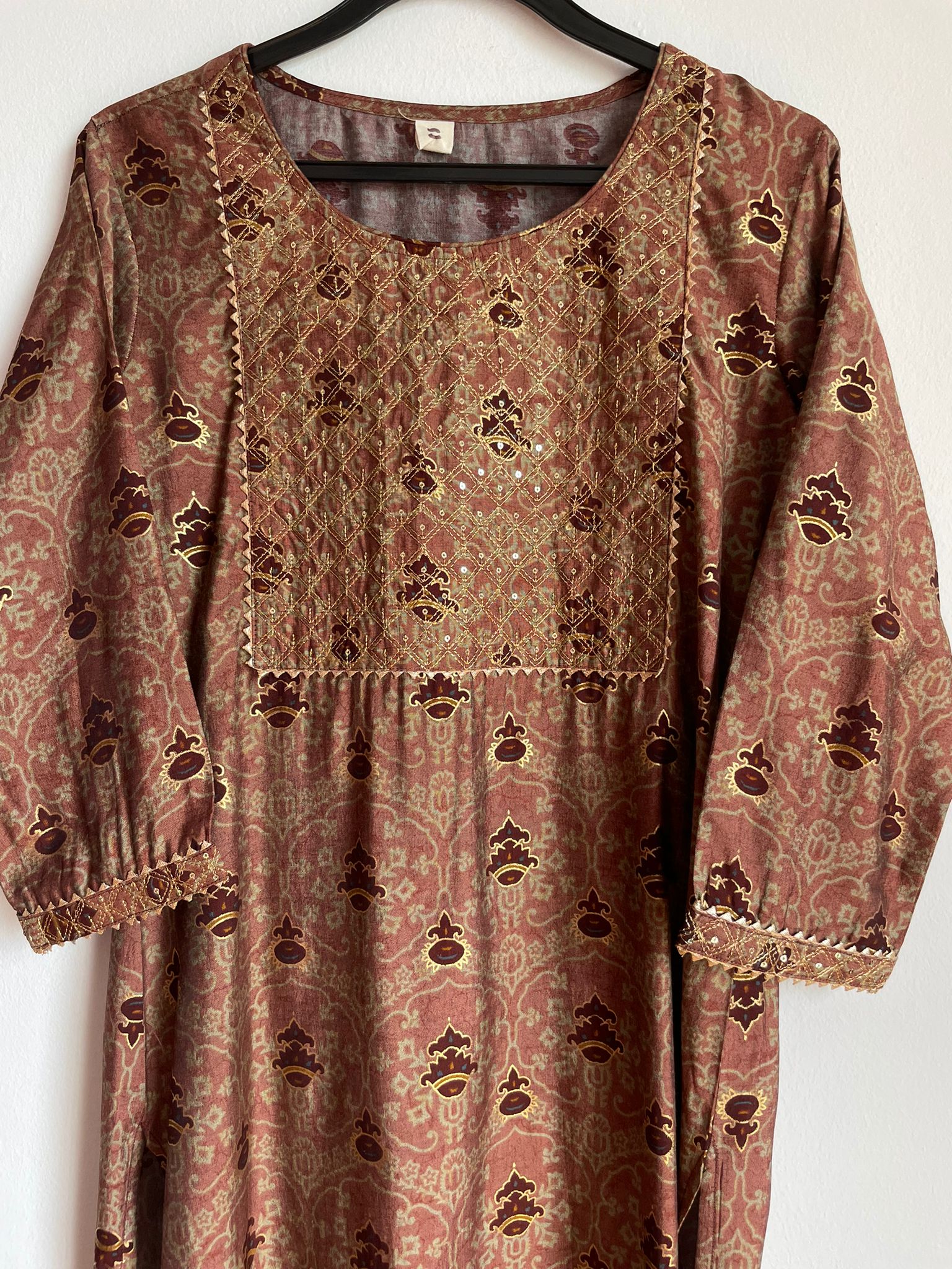 Indian ethnic wear in brown for all sizes. Silk suit for all occasions