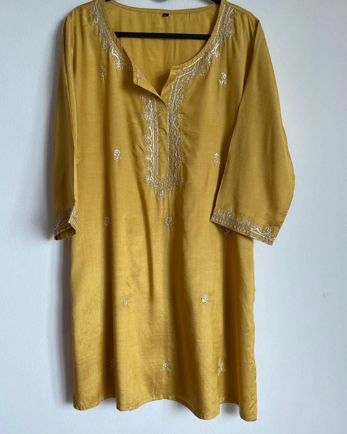 bright yellow indian ethnicwear for women, with embroidery. High quality