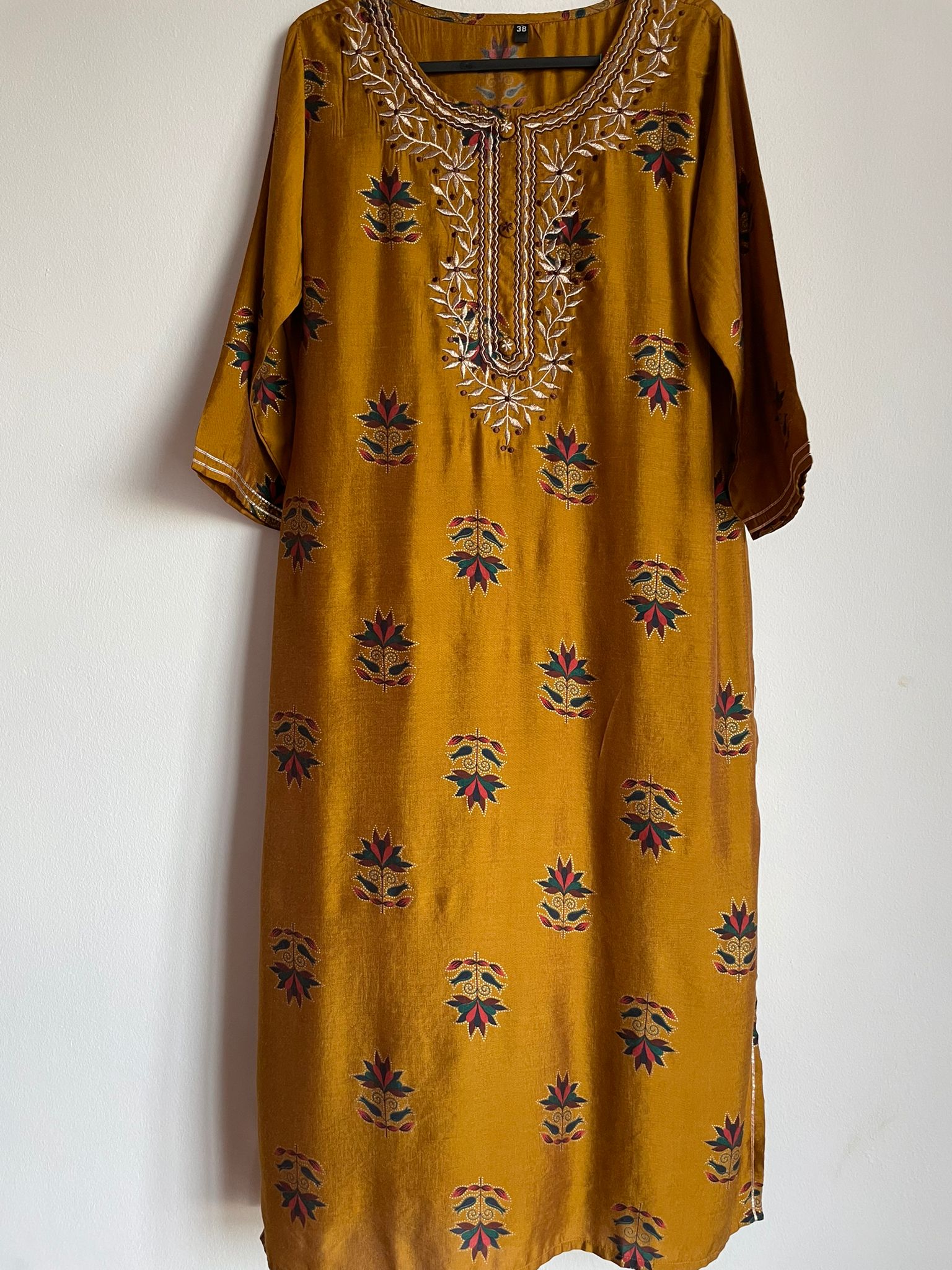 traditional indian suit in brown